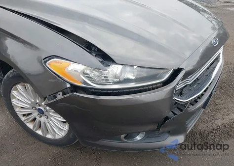 2015 Ford Fusion Energi Se Luxury z USA, uszkodzony, nr VIN 3FA6P0PU8FR286435